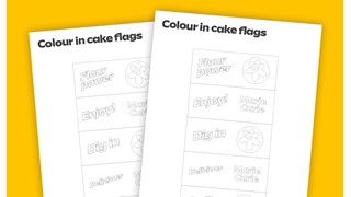 Blank cake flags on a yellow background